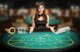 Filipino player watching live casino dealer stream on smartphone at home